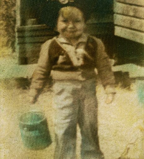 Little boy with bucket